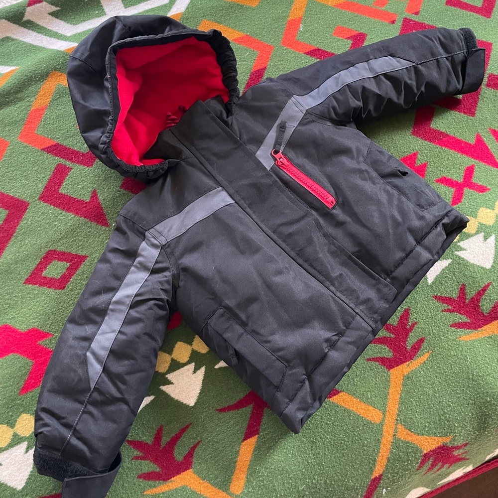 Brand new, never been worn, 12 month snow jacket!